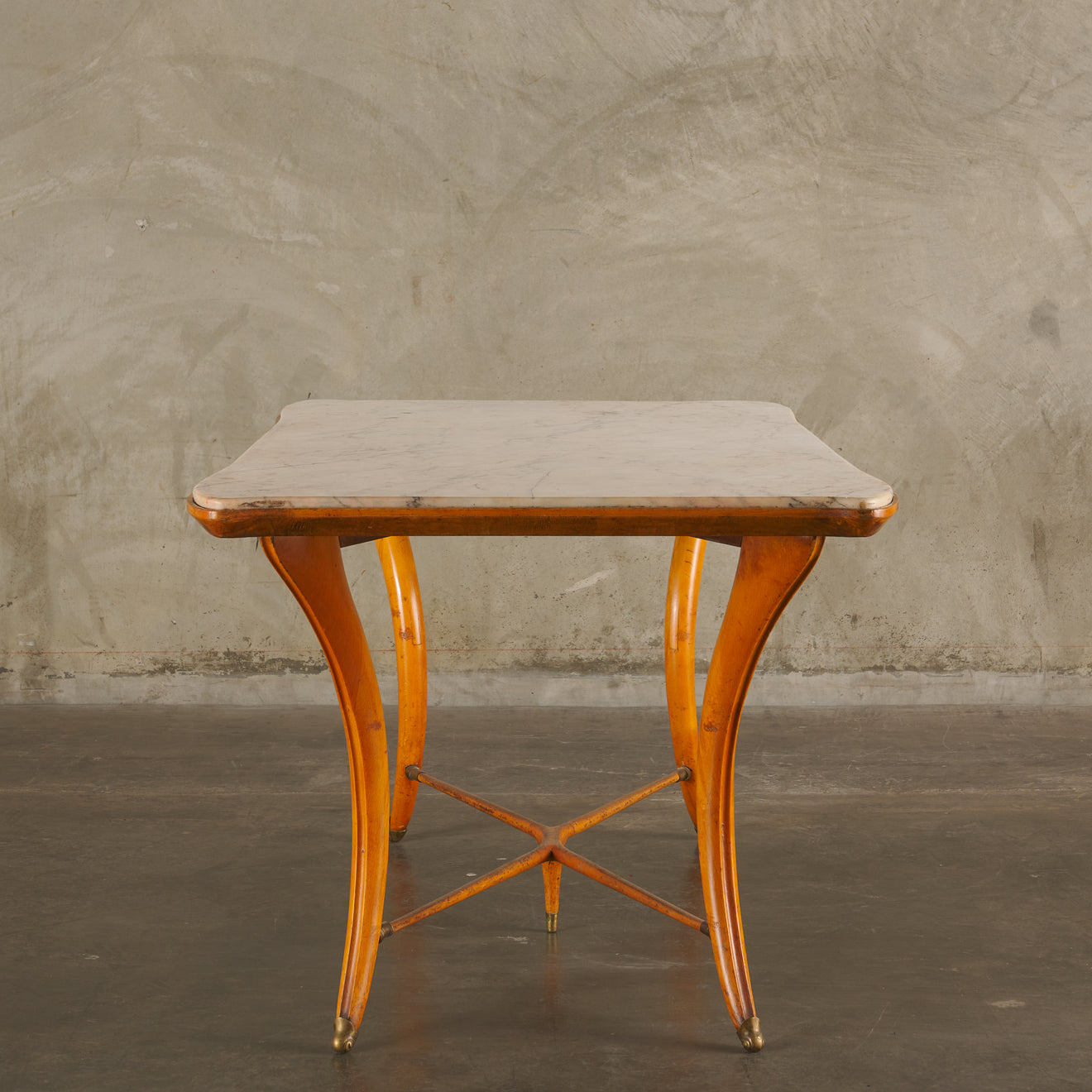 MARBLE TOP DINING TABLE WITH BRASS SABOTS